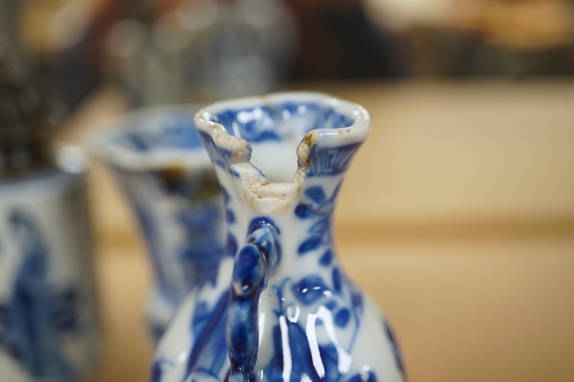 Five Chinese blue and white small vases, Kangxi period, one Dutch silver mounted as a sugar castor, tallest 11cm. Condition - varies